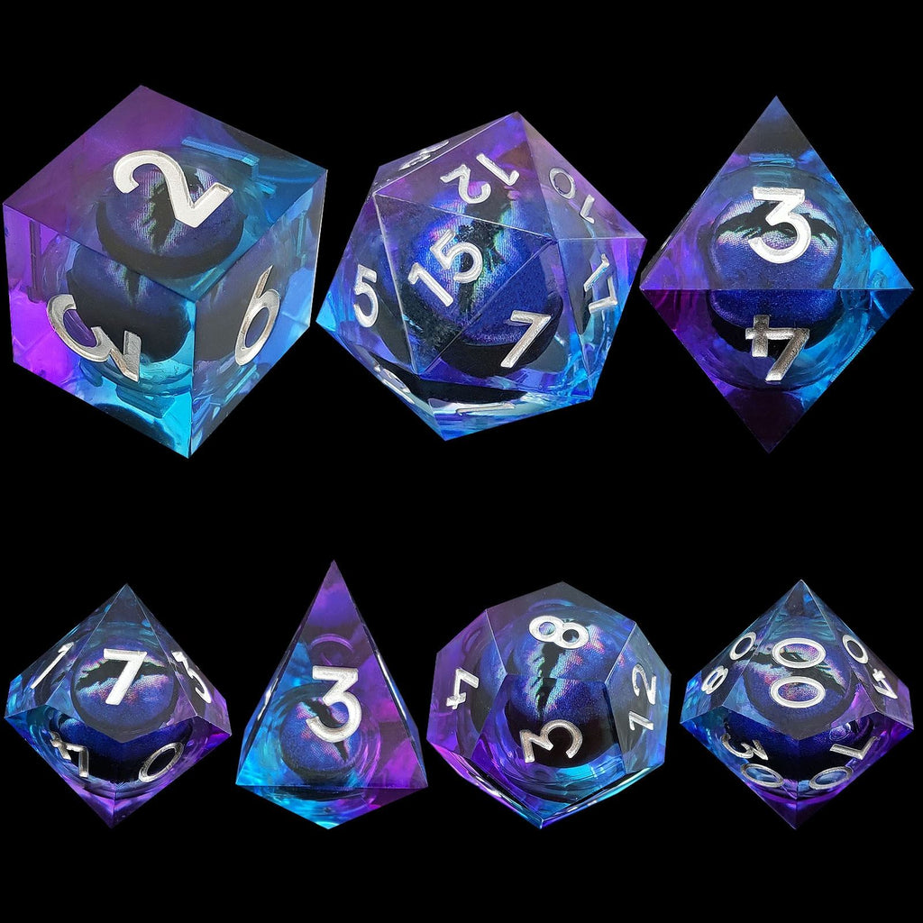 Set of colorful polyhedral dice on a black background