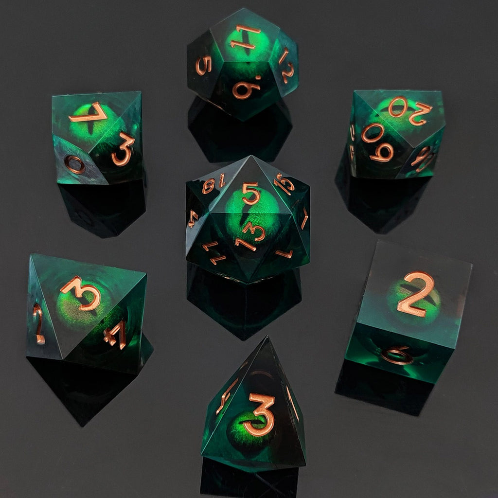 Set of green and copper Dragon Eye on a dark background