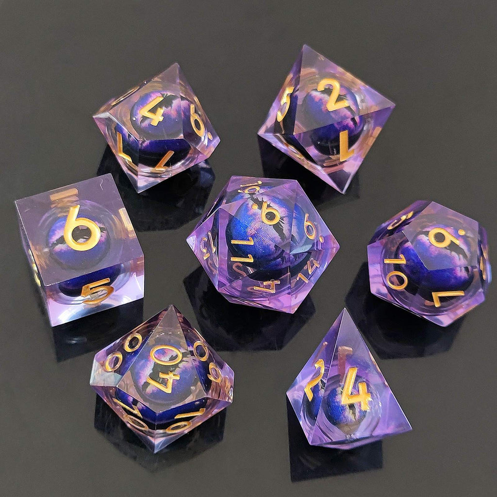 Set of purple and blue Dragon Eye Liquid Core DND Dice with gold numbers on a dark background