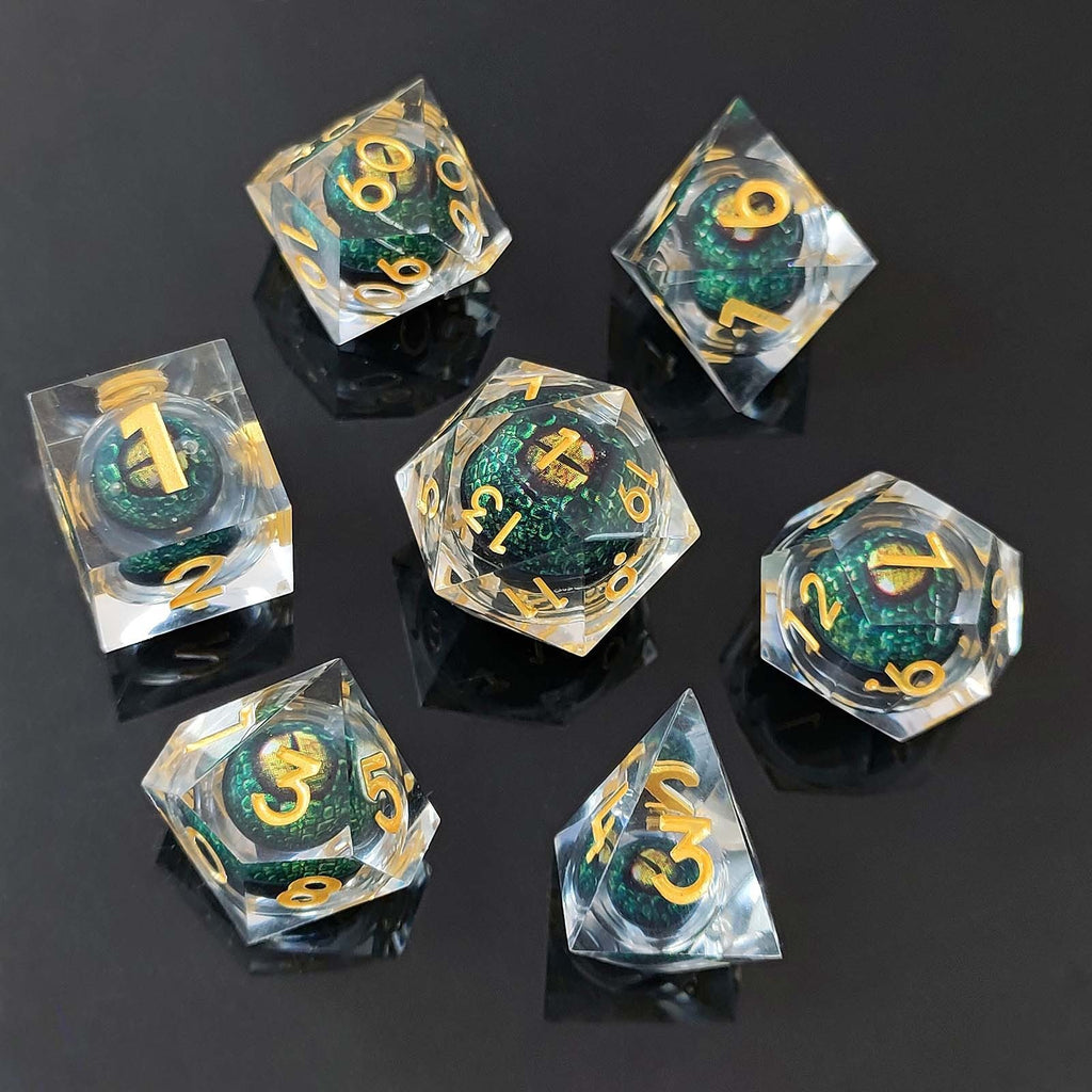 Set of Dragon Eye Liquid Core DND Dice with green and gold numbers on a dark background