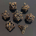 Dragon Hollow Metal D&D Dice with intricate designs on a dark surface