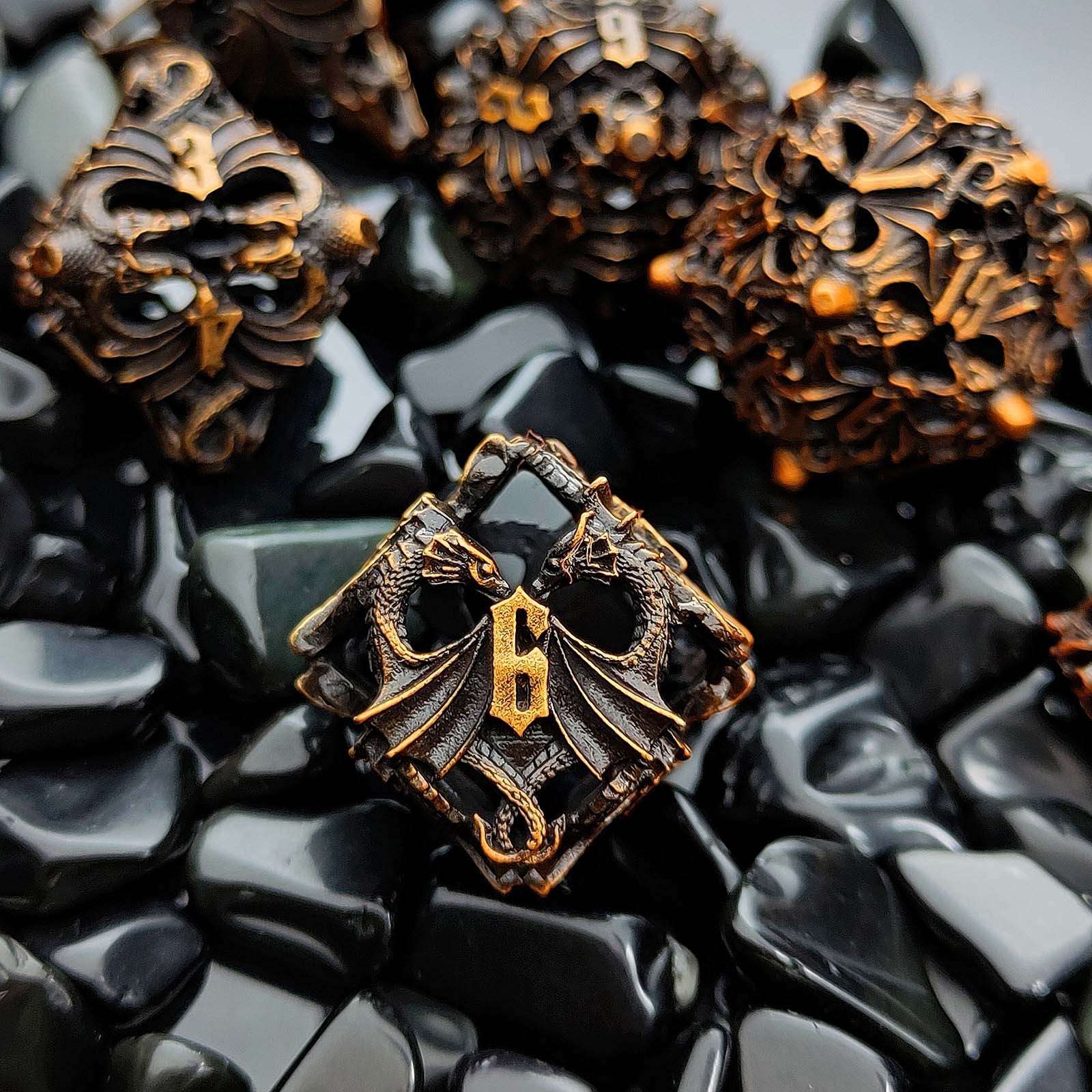 Dragon Hollow Metal D&D Dice with intricate design on a dark textured surface