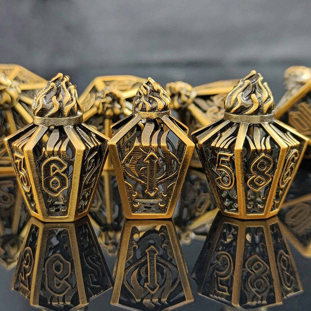 Bronze lantern-like metal hollow dnd dice with numbers and intricate designs on a reflective surface.