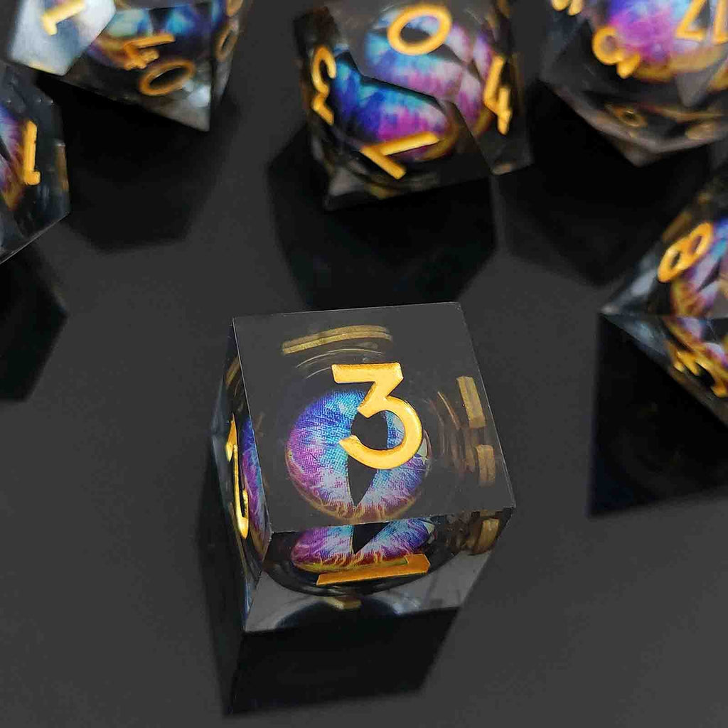 Colorful Floating Dragon Eye Liquid Core DND Dice set with a prominent number 3 on a black background