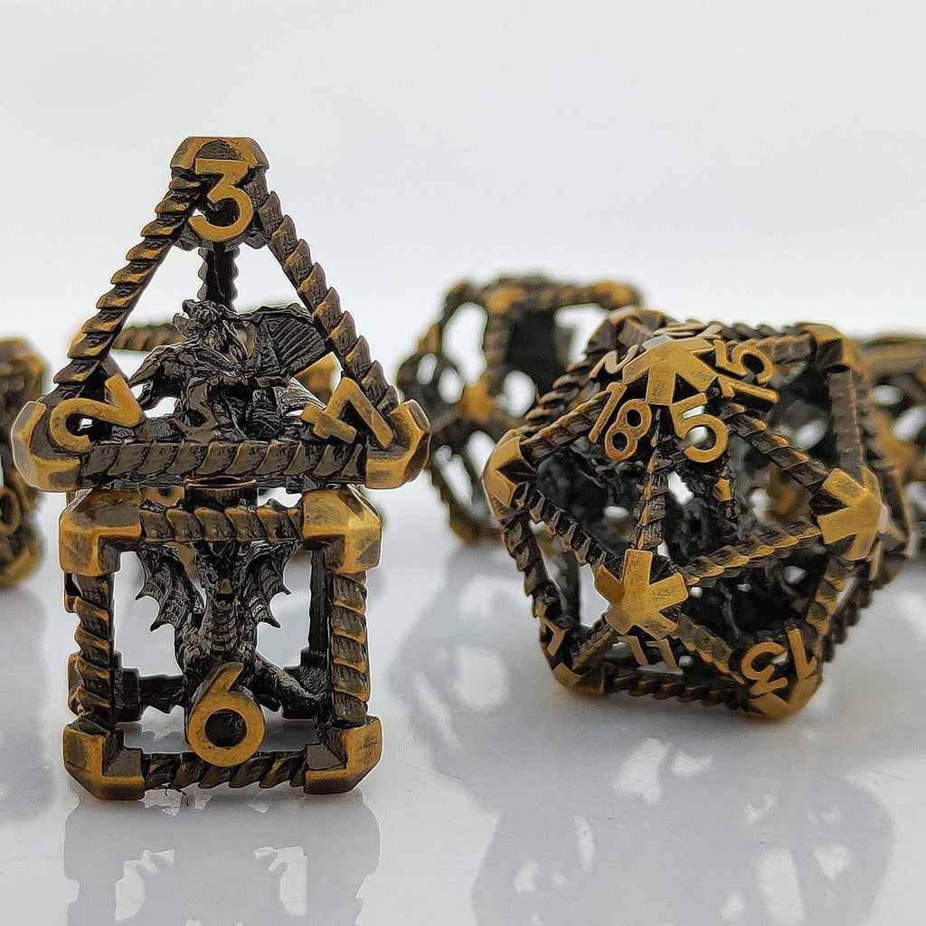 Copper Polyhedral RPG metal dice with intricate designs and numbers on a reflective surface