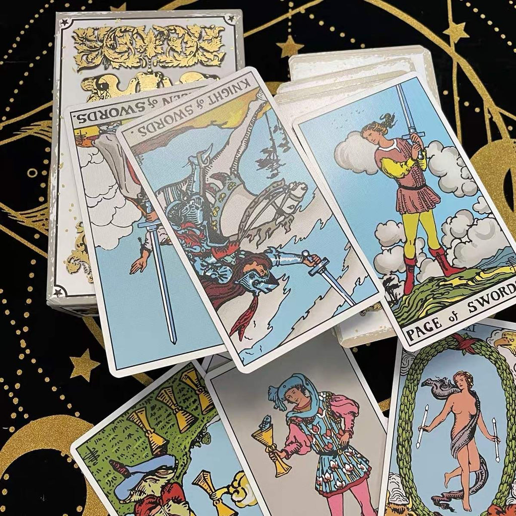 Collection of tarot cards with detailed artwork on a decorative background