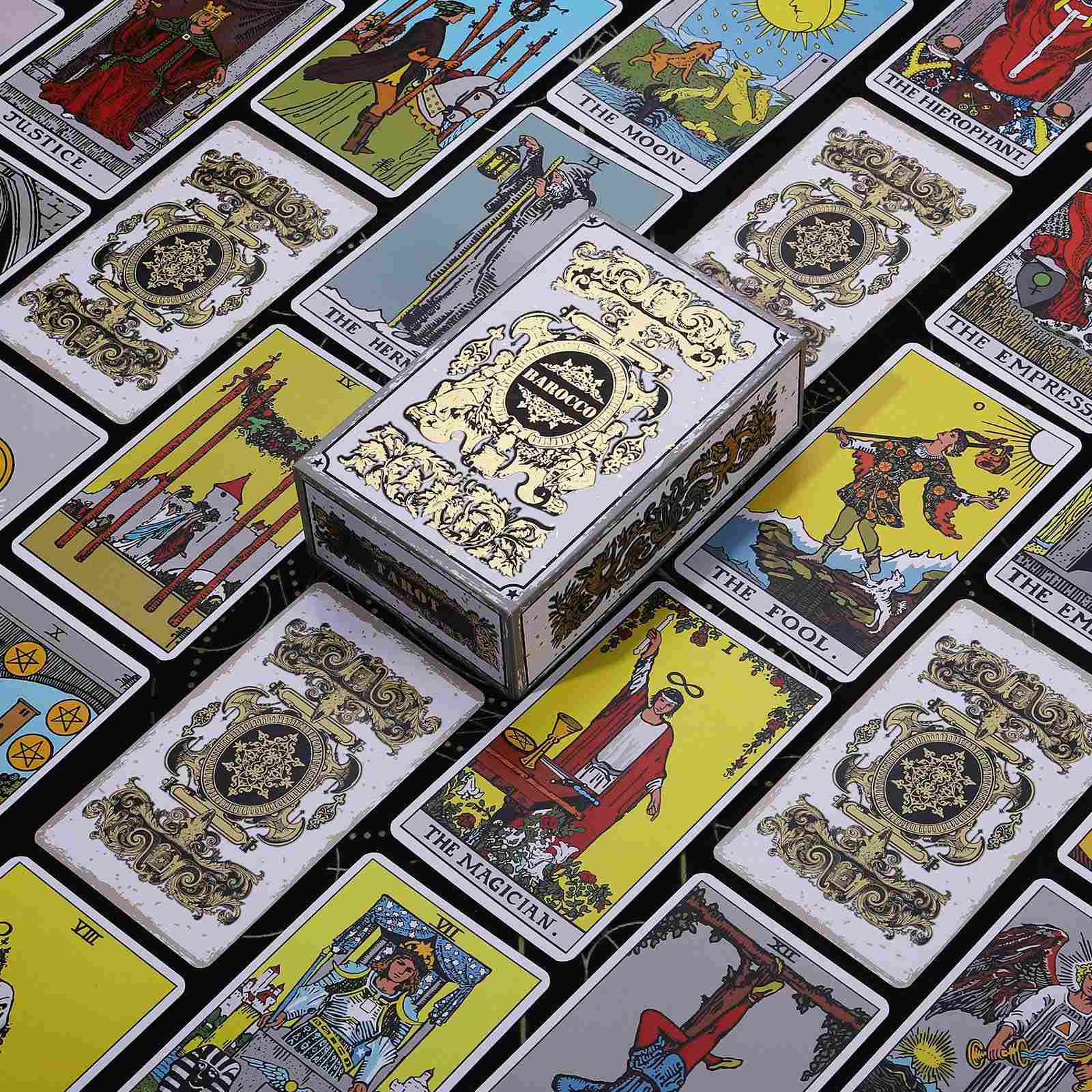 Collection of tarot cards with Golden Baroque Ornate Crest and Gold Glitter Gilded Edges, and a decorative box on a black background