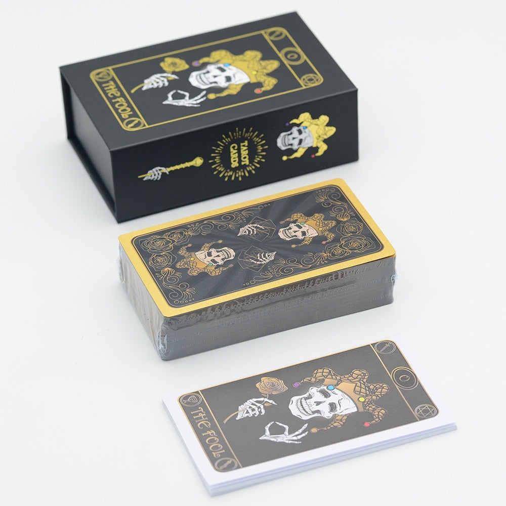 Gothic Skull Black Gold Foil tarot cards with skull design on a white background