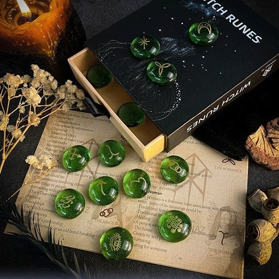 Green runes on a mystical book with 'Witch Runes' packaging.
