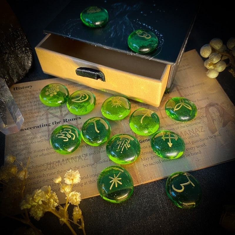 Green crystal runes on an open book with a magical box in the background