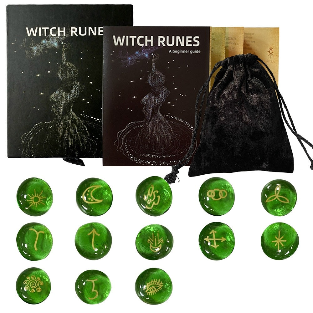 Witch Rune set with booklet, bag, and green rune stones on a white background