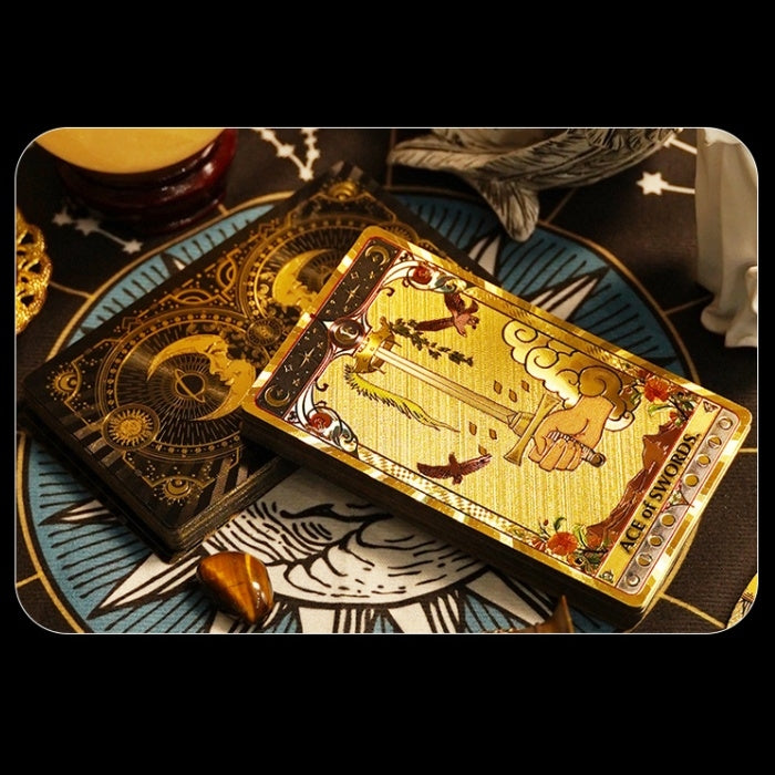 premium gold foil tarot card with intricate design on a decorative surface