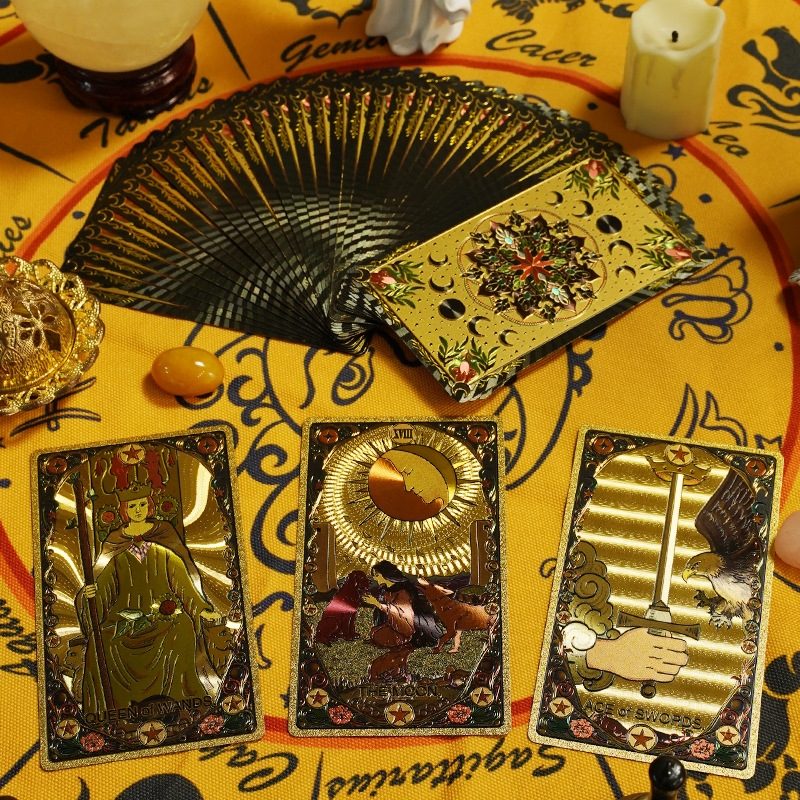 Kaleidoscope Holographic Rainbow Foil Tarot cards on a yellow tablecloth with decorative elements