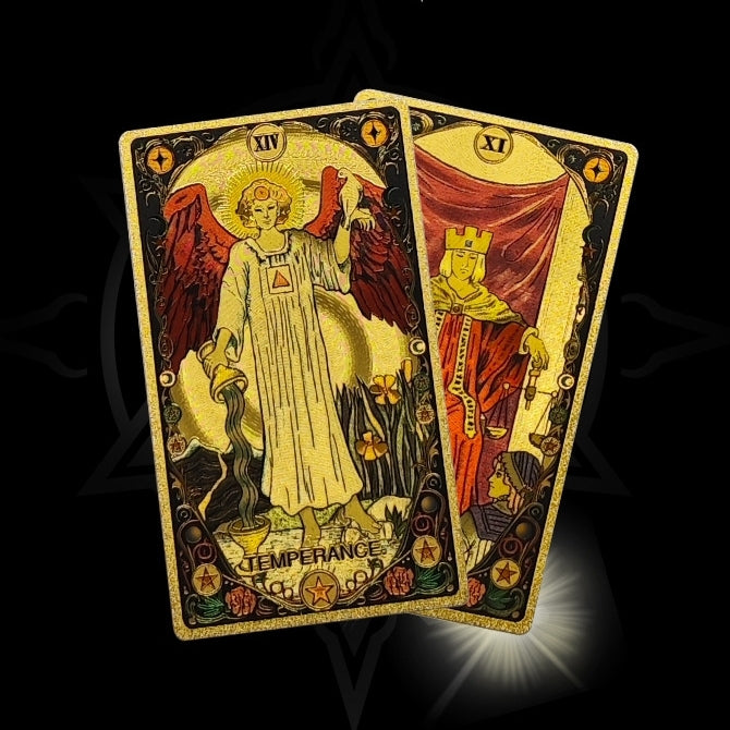 Two Kaleidoscope Holographic Rainbow Foil tarot cards, 'Temperance' and 'Judgment', on a dark background