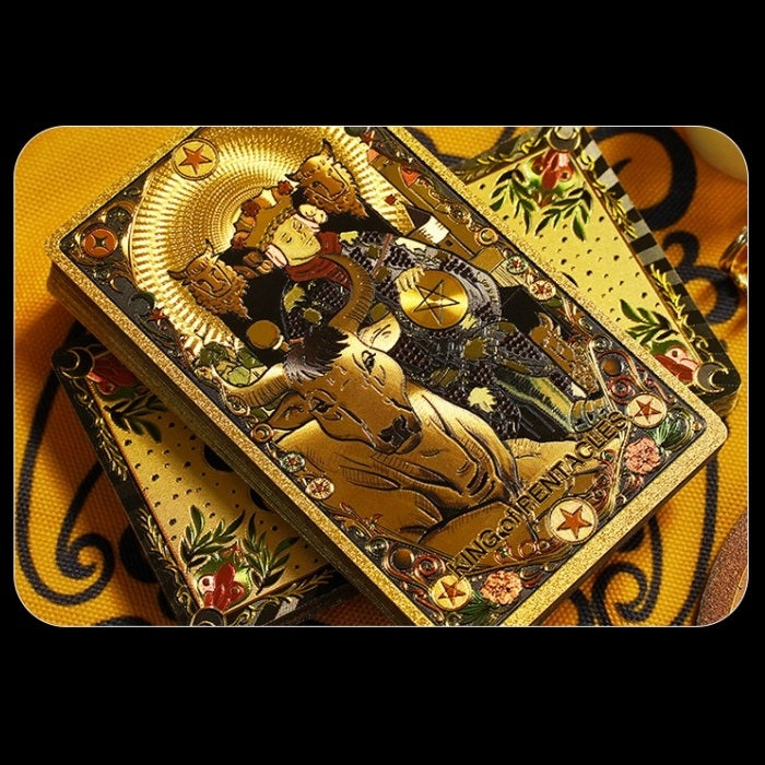 Kaleidoscope Holographic Rainbow Foil tarot cards with intricate designs on a yellow fabric background