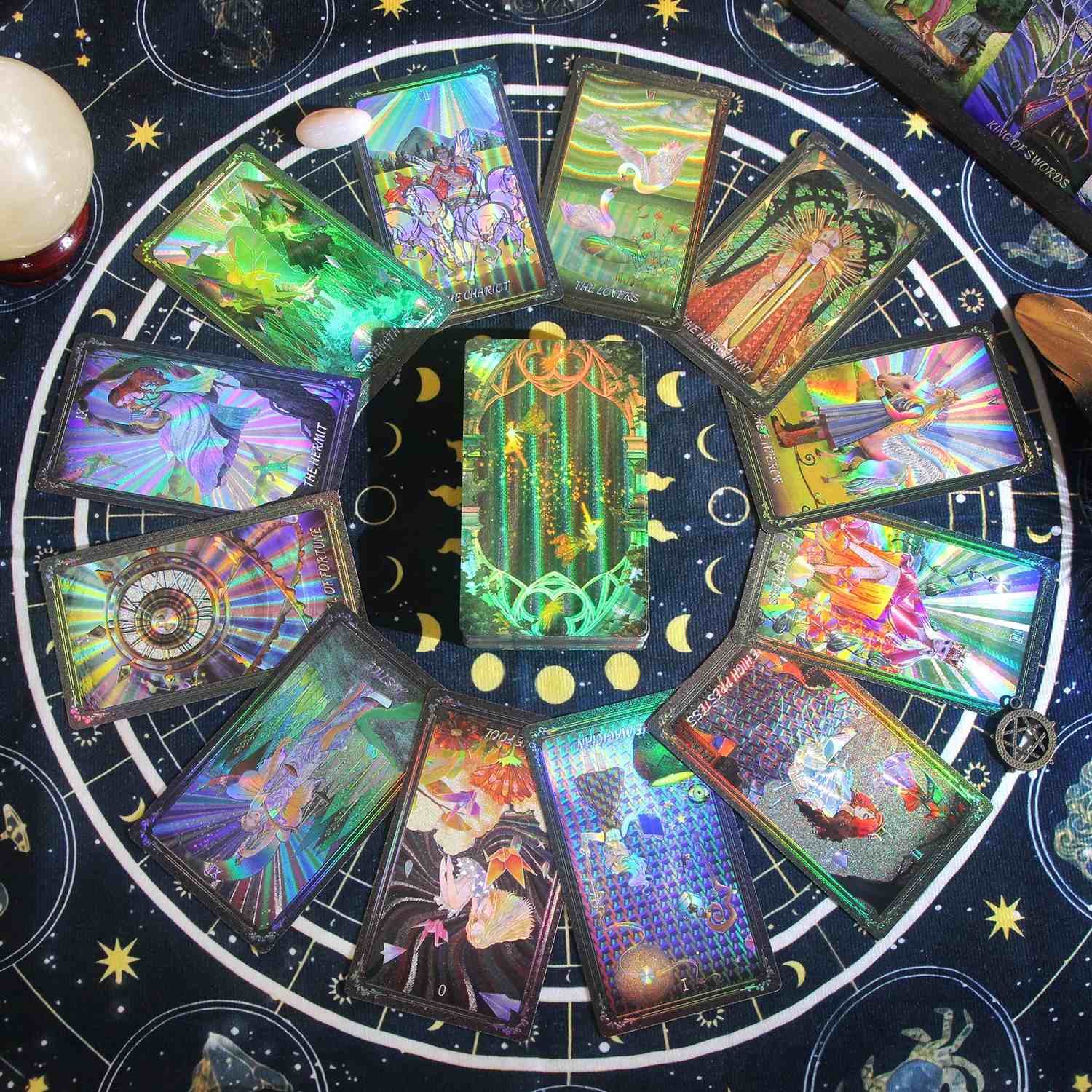 Colorful Laser Etched tarot cards arranged in a circular pattern on a starry night sky background.