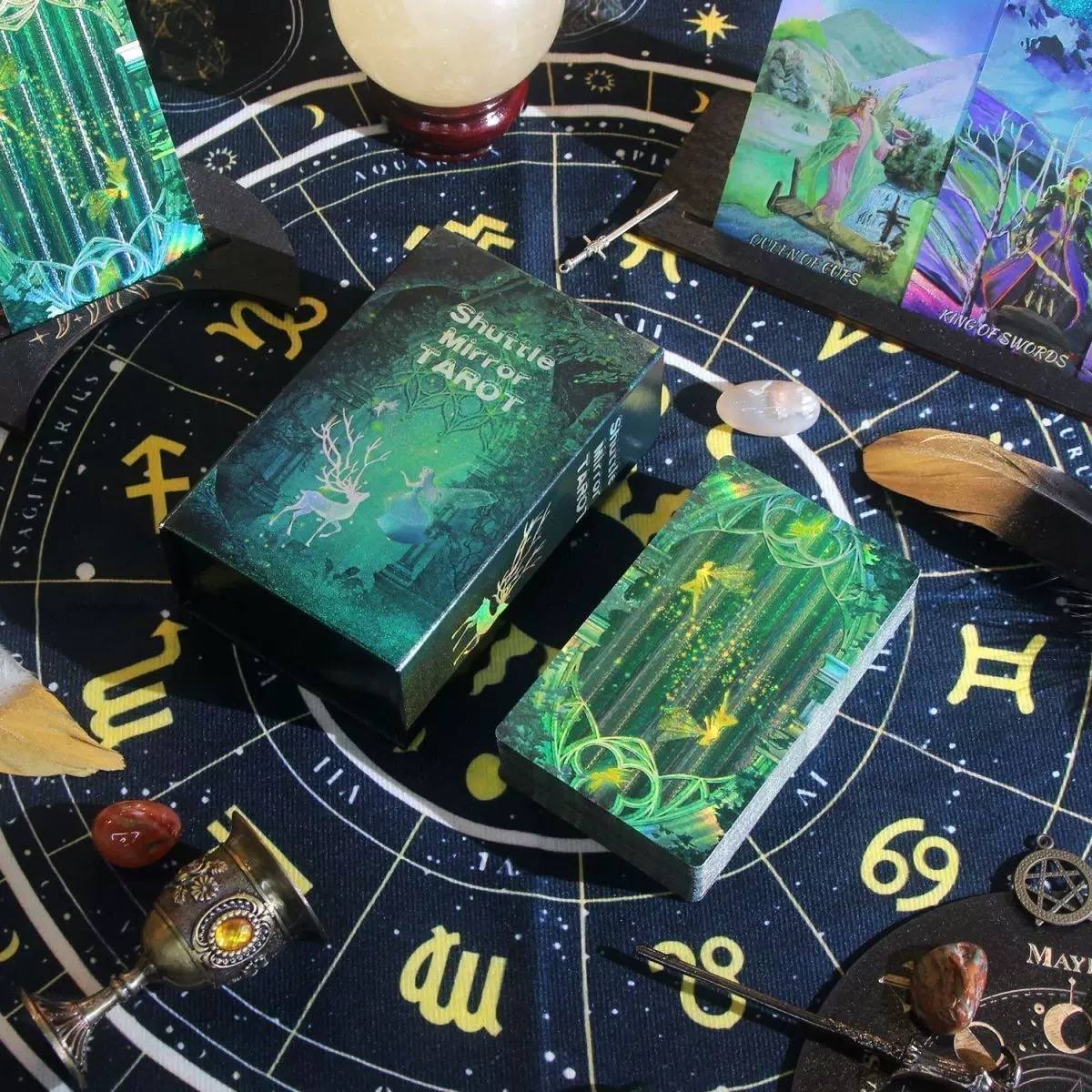 Obsidian Mirror Gold Foil Laser Etched  Tarot Cards on a star map with tarot cards and crystals.