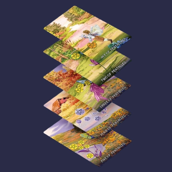 Set of Laser Etched Gold Foil tarot cards with colorful landscapes and nature-themed designs on a dark blue background.