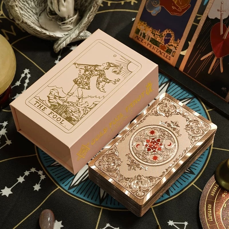 Decorative Pink Blitz Foil deck of cards with intricate designs on a tarot card background