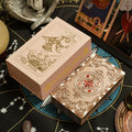 Decorative Pink Blitz Foil deck of cards with intricate designs on a tarot card background