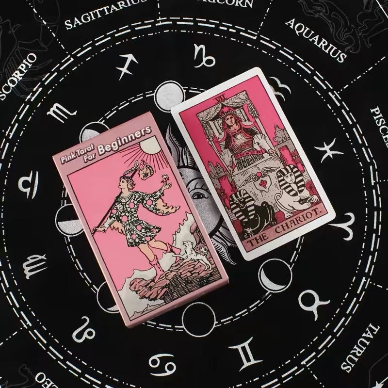 Two pink tarot cards on a black background with zodiac signs