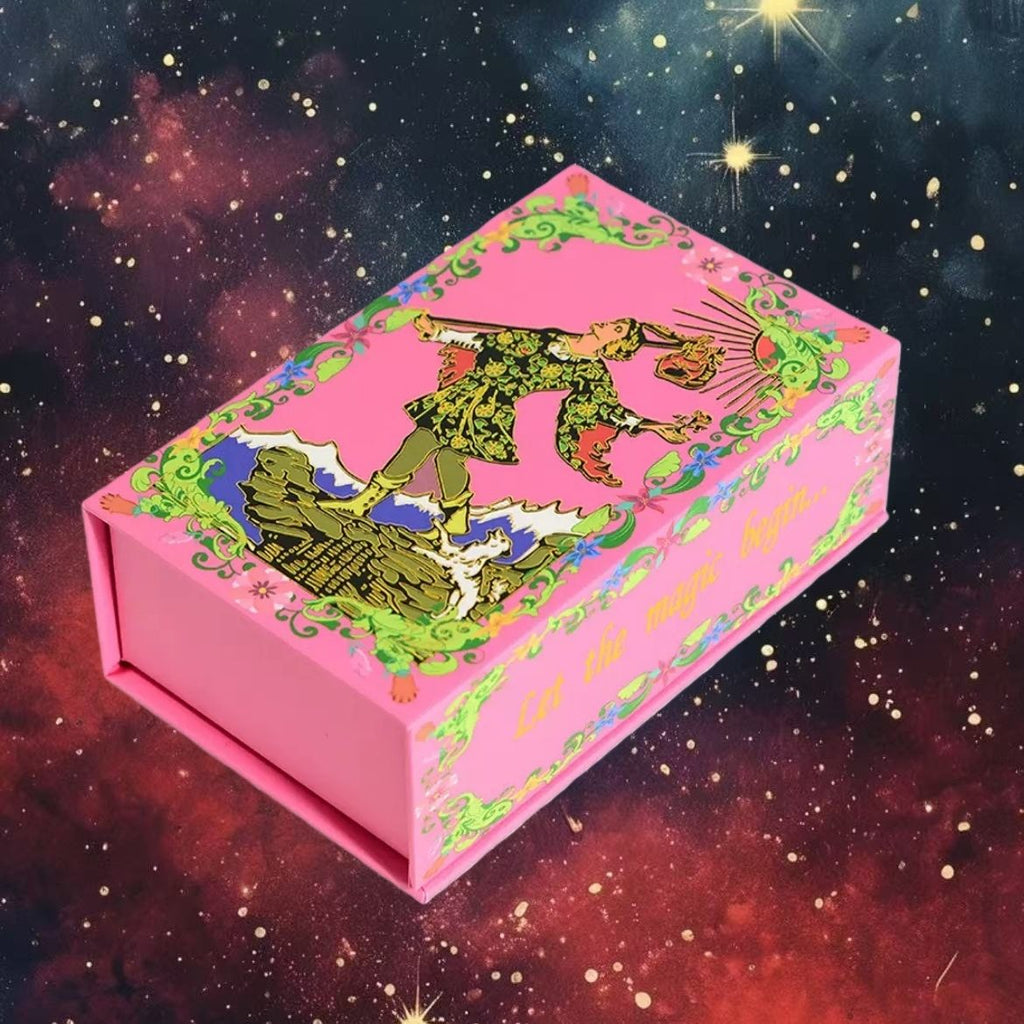 Pink tarot card box with colorful designs on a starry space background