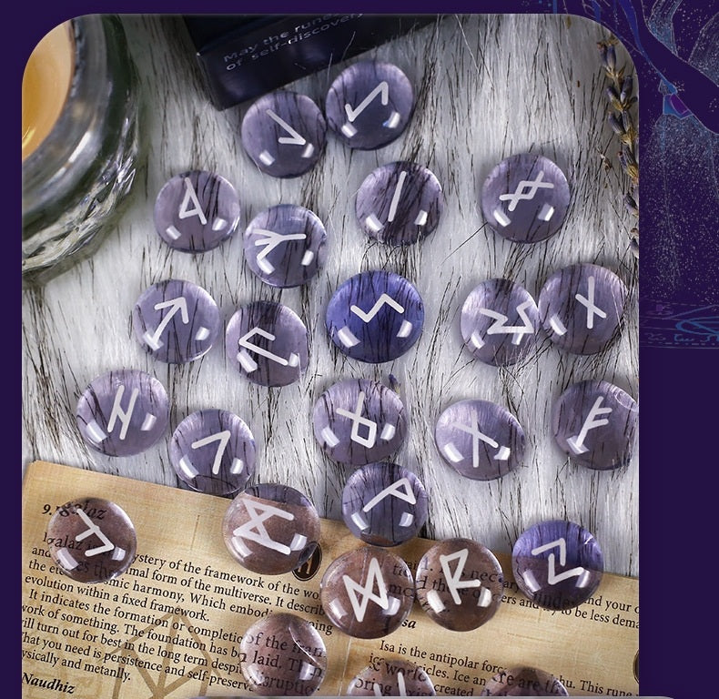Purple rune stones on a wooden surface with a blurred background