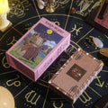 Smith-Walter Rose Gold Foil Tarot Cards packaging on a tarot card deck with astrological symbols.