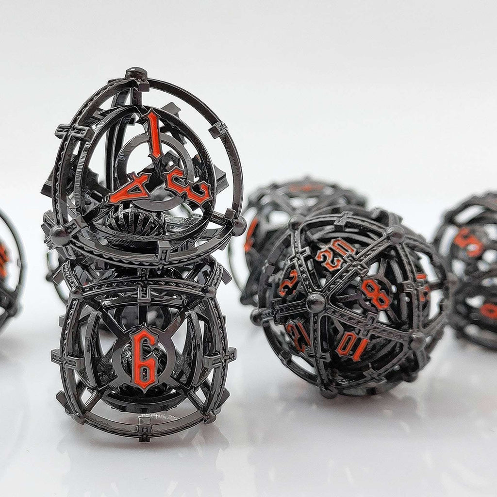 Black and orange Hollow Metal Orb Chime DND dice set on a white background