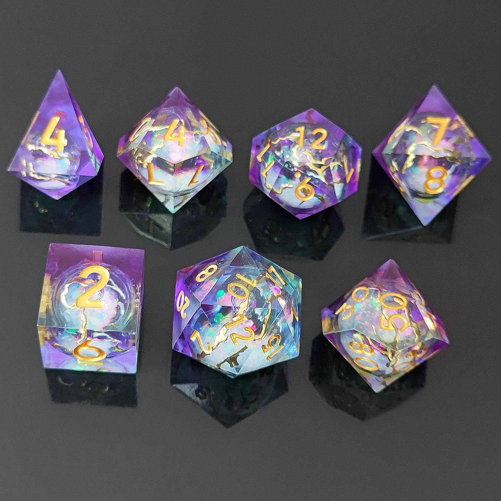 Set of colorful  liquid core resin  polyhedral dice with numbers on a dark background
